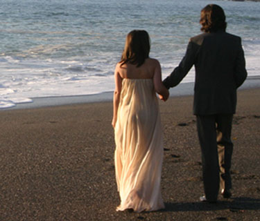 Bride and groom, back view of the gown